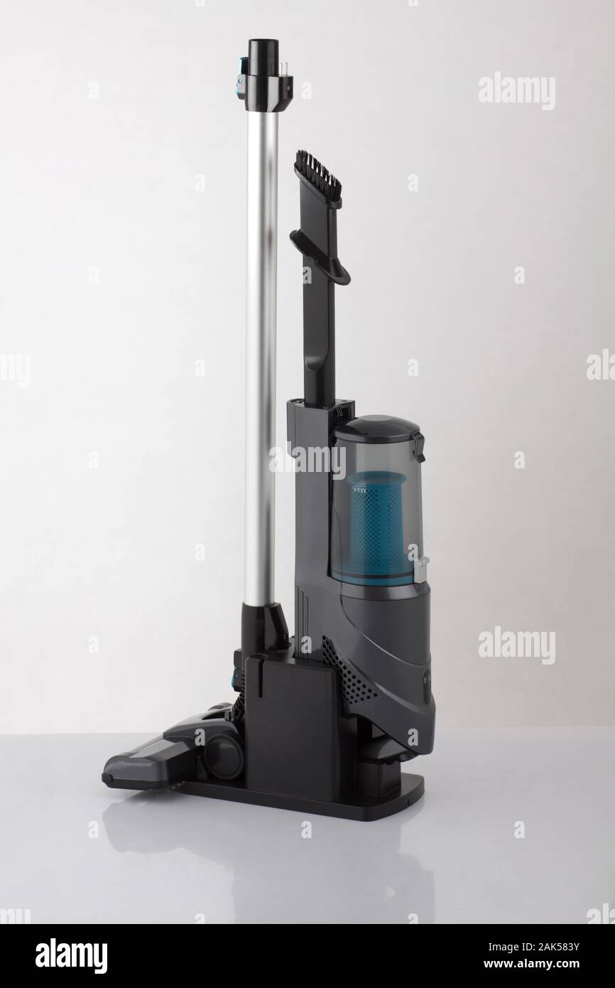 Modern vacuum cleaner in keeping stand isolated on white background Stock Photo