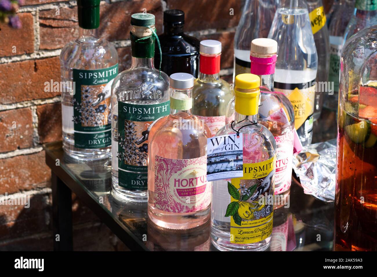 Bottles of alcohol on a table Stock Photo