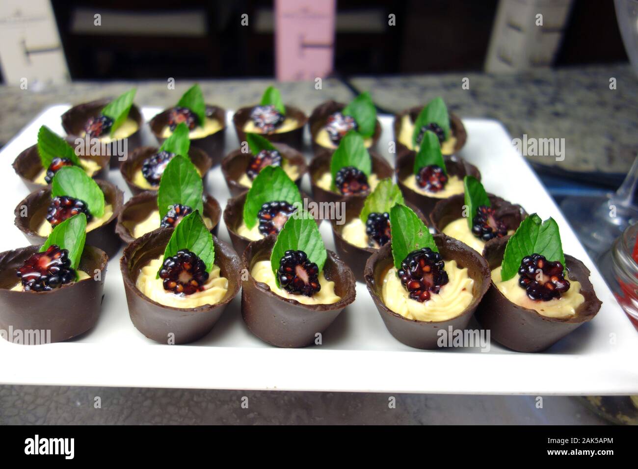 Small Chocolate Cup Cakes filled with Creme Patissiere in the Breakfast  Buffet at the Azul Beach Resort Hotel, Puerto Morelos, Riviera Maya, Cancun  Stock Photo - Alamy