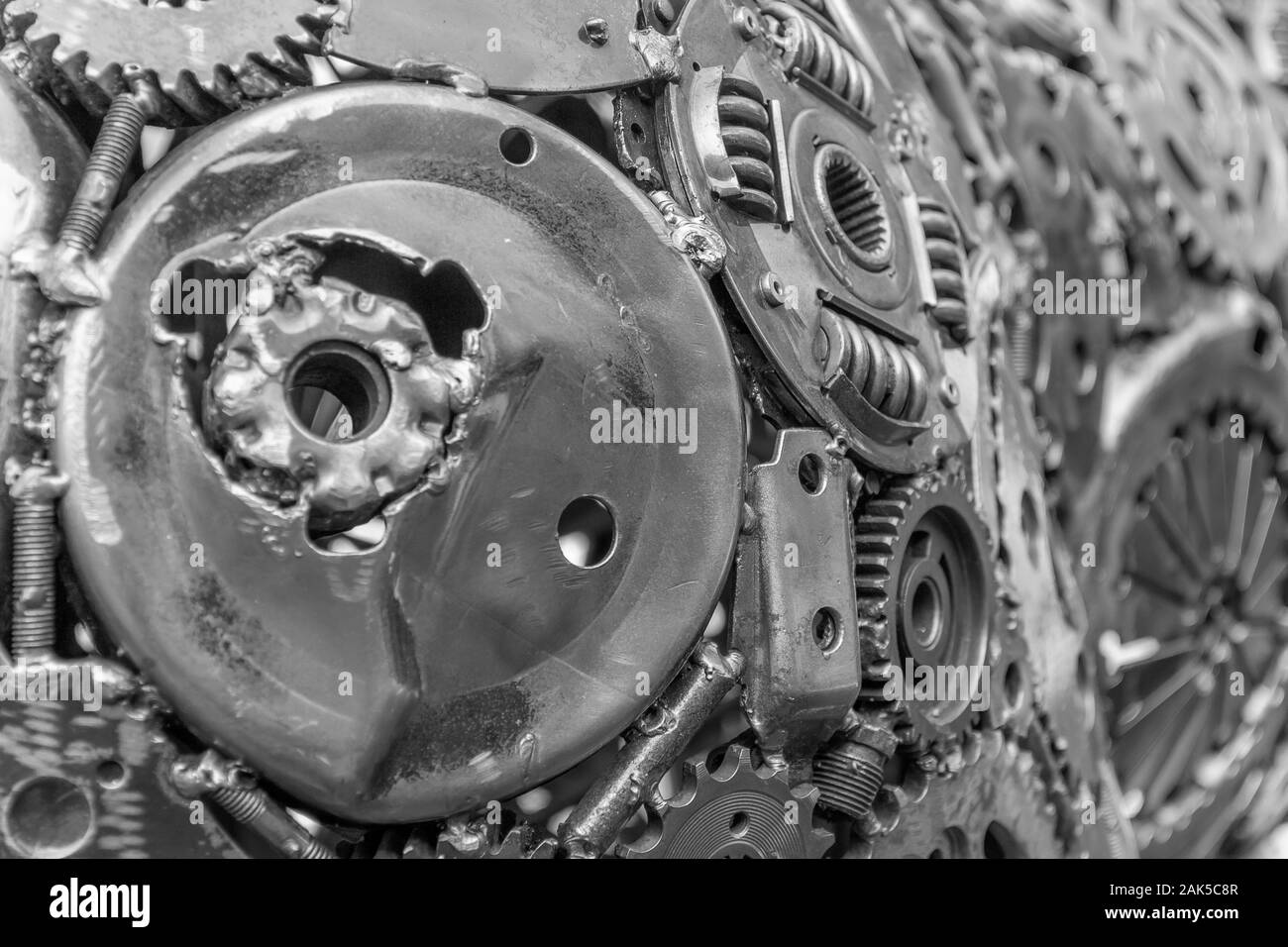 full frame metallic mechanical background with gear wheels and other material Stock Photo