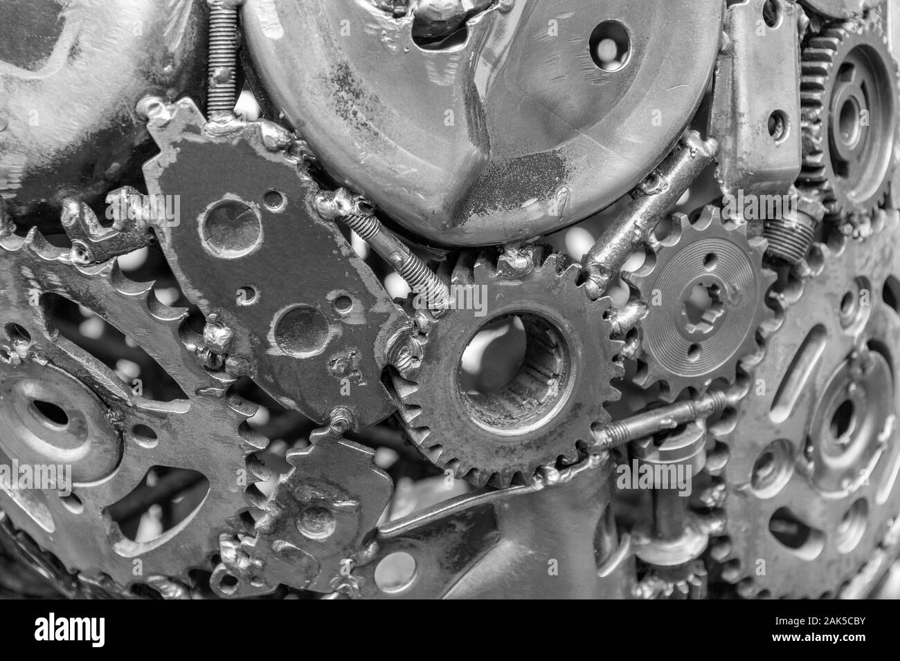 full frame metallic mechanical background with gear wheels and other material Stock Photo