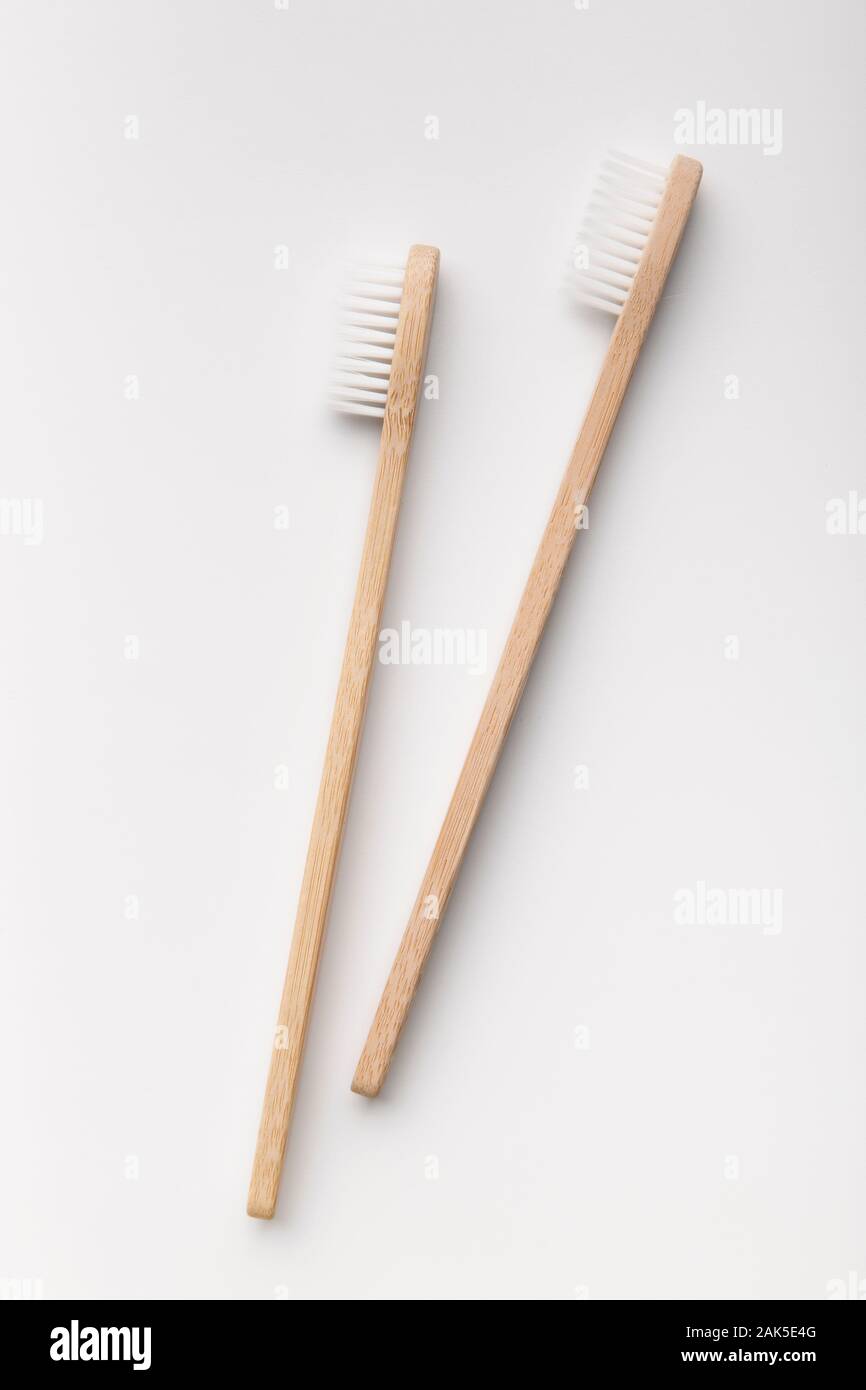 Two bamboo toothbrushes isolated on the white background. Zero waste ...