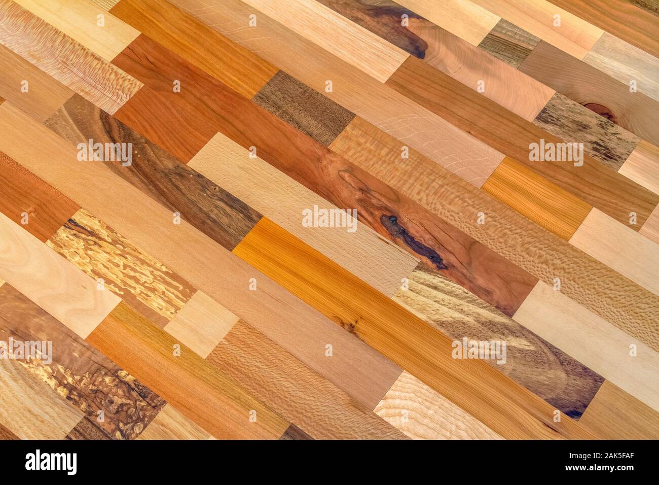 full frame abstract wooden Parquetry background made of mixed wood types Stock Photo