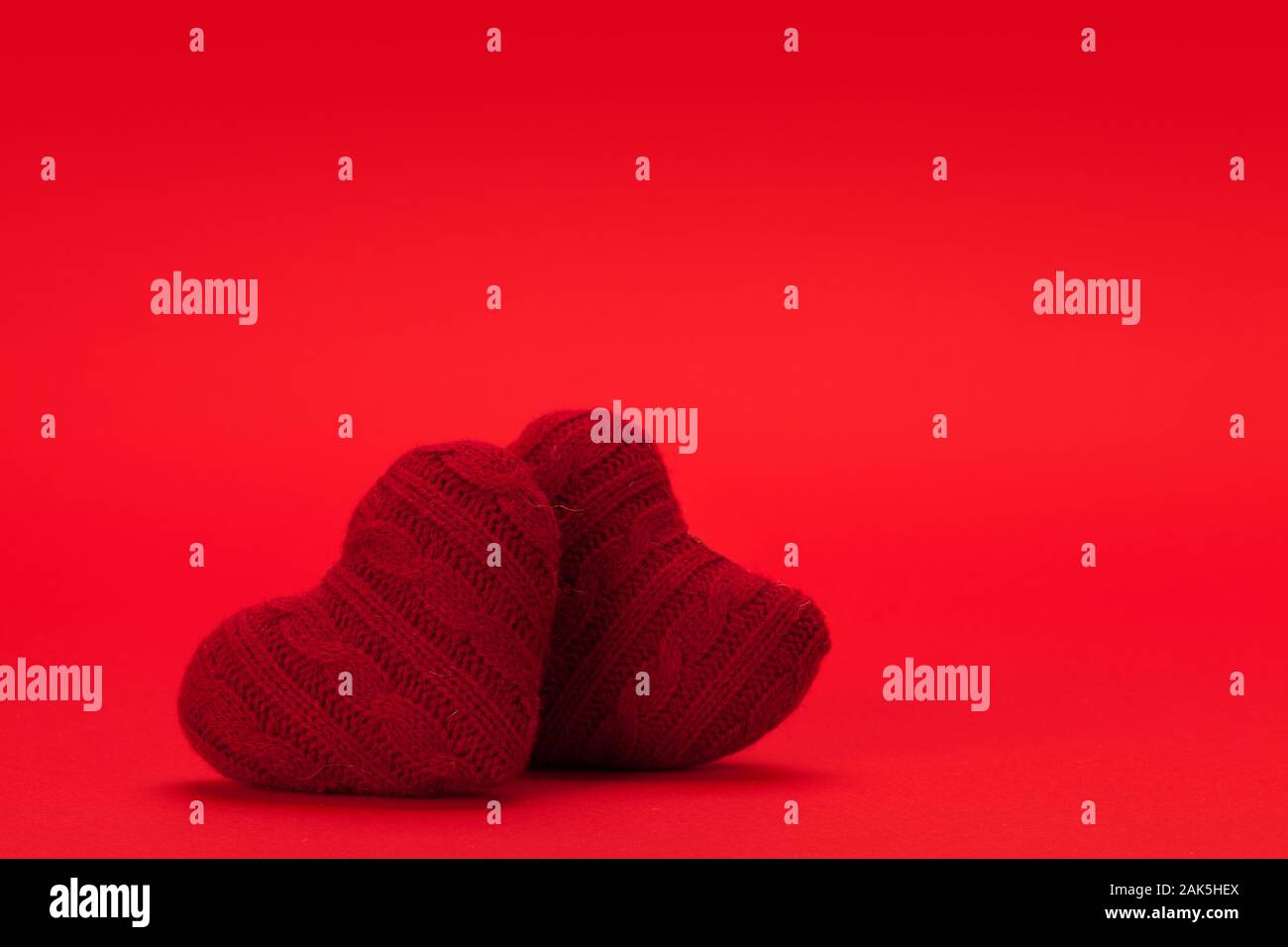 Valentines day heart decor over red background with copy space for your ...