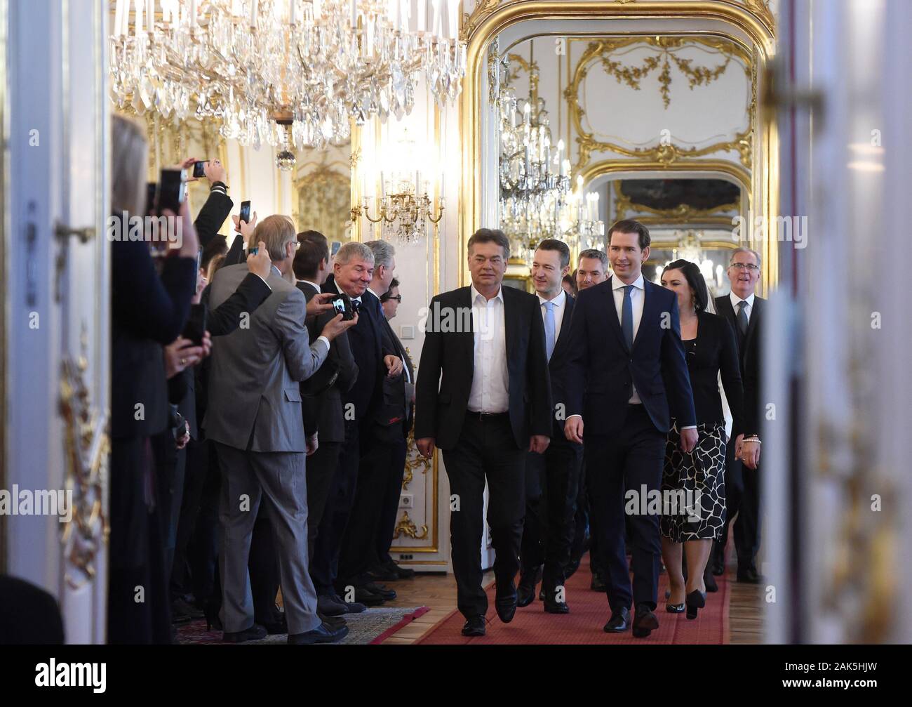 Vienna, Autstria. 7th Jan, 2020. Austria's new Chancellor Sebastian Kurz (1st R, front) and new Vice Chancellor Werner Kogler (2nd R, front) enter the swearing-in ceremony in Vienna, Autstria, Jan. 7, 2020. Austria's new coalition government was sworn in by President Alexander Van der Bellen at the presidential residence of Hofburg Palace on Tuesday. Credit: Guo Chen/Xinhua/Alamy Live News Stock Photo