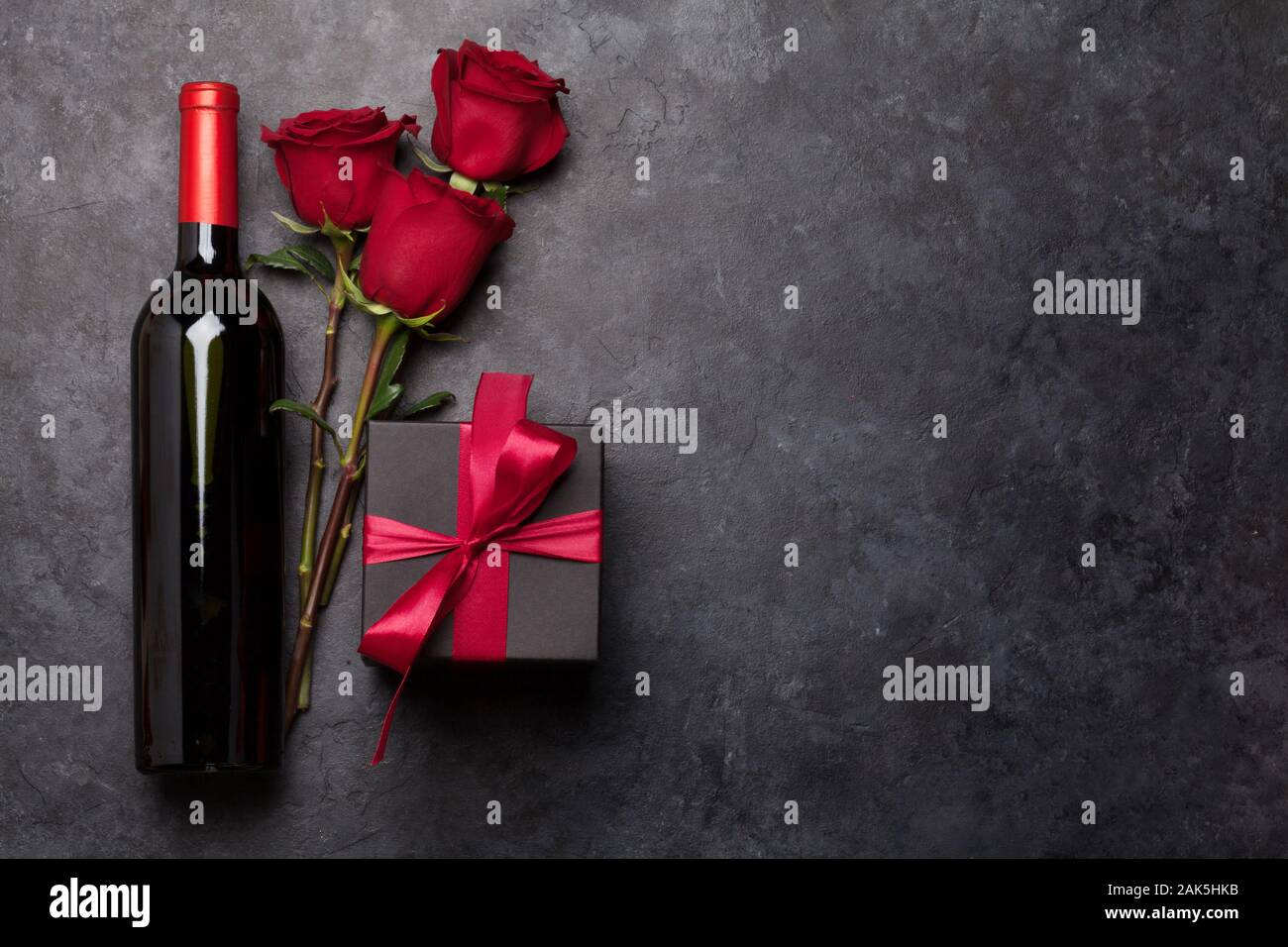 Valentines day greeting card with rose flowers bouquet and red wine ...