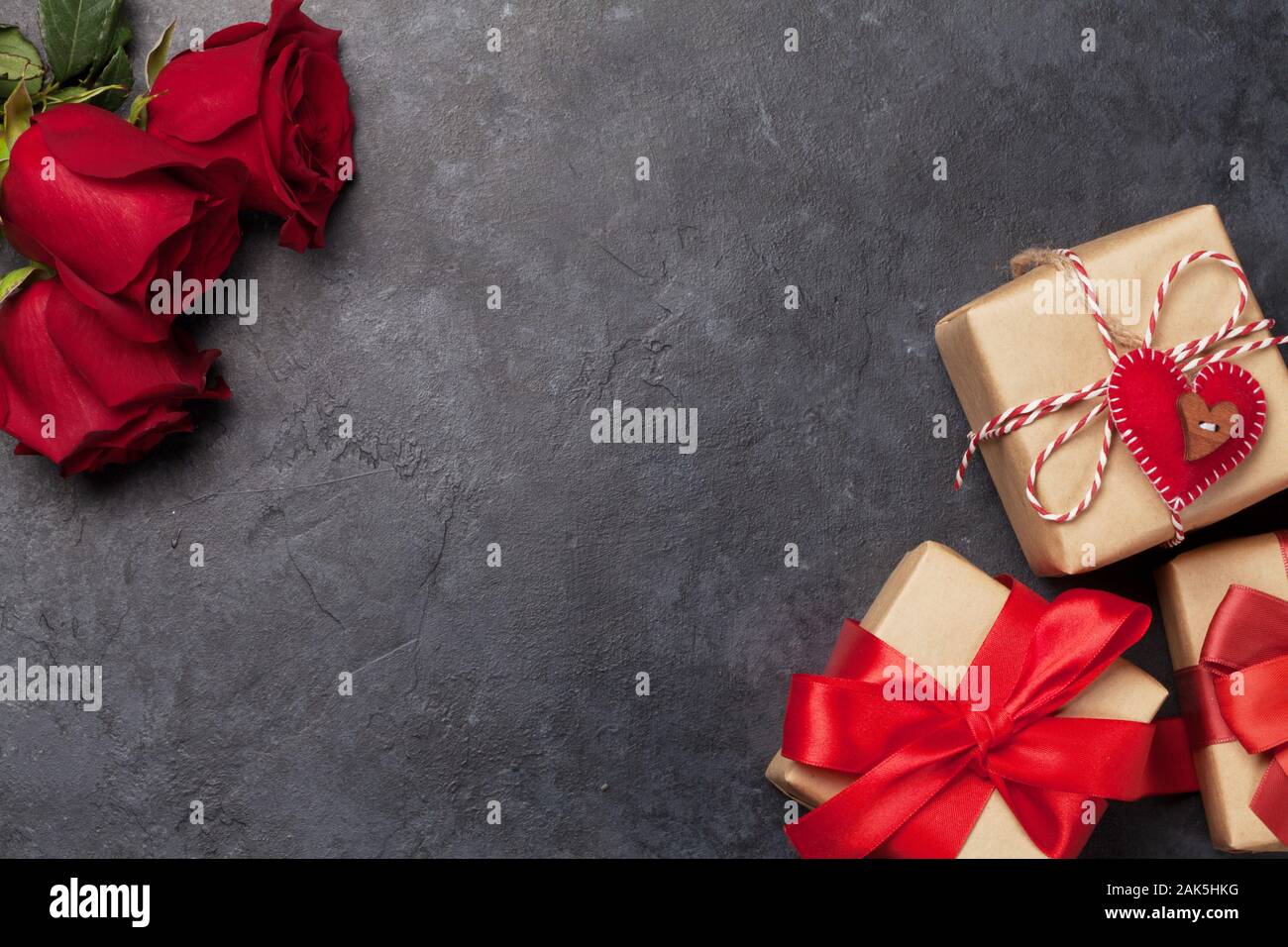 Valentines day greeting card with rose flowers bouquet and gift boxes ...