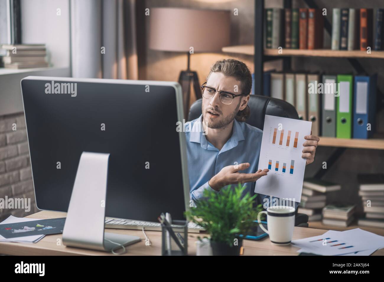 Man working with drafts in office hi-res stock photography and images ...