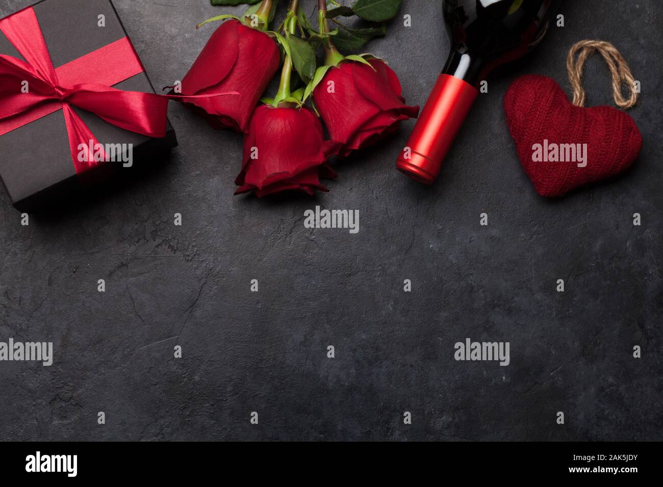 Valentines day greeting card with rose flower bouquet, red wine and ...