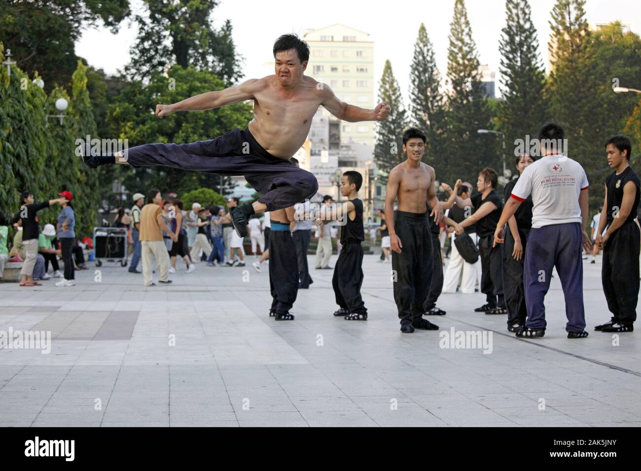 Earlymorning kung fu exercises at Le Van Tam Park in Ho Chi Minh City