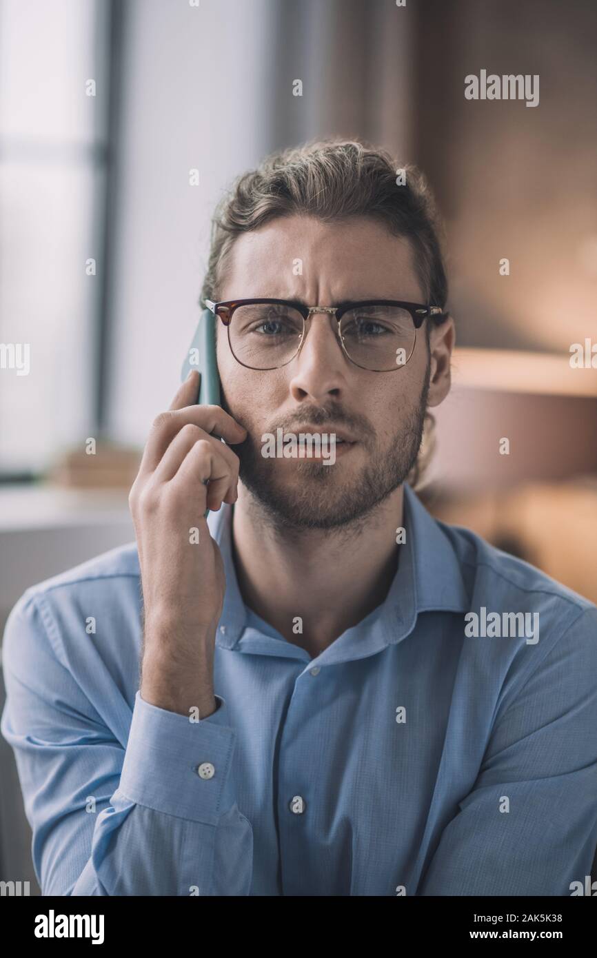 Serious bearded man speaking hi-res stock photography and images - Alamy