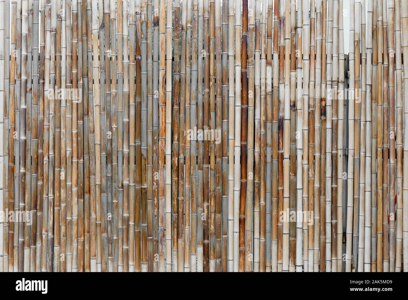 Ancient bamboo border wall made from bamboo sticks Stock Photo
