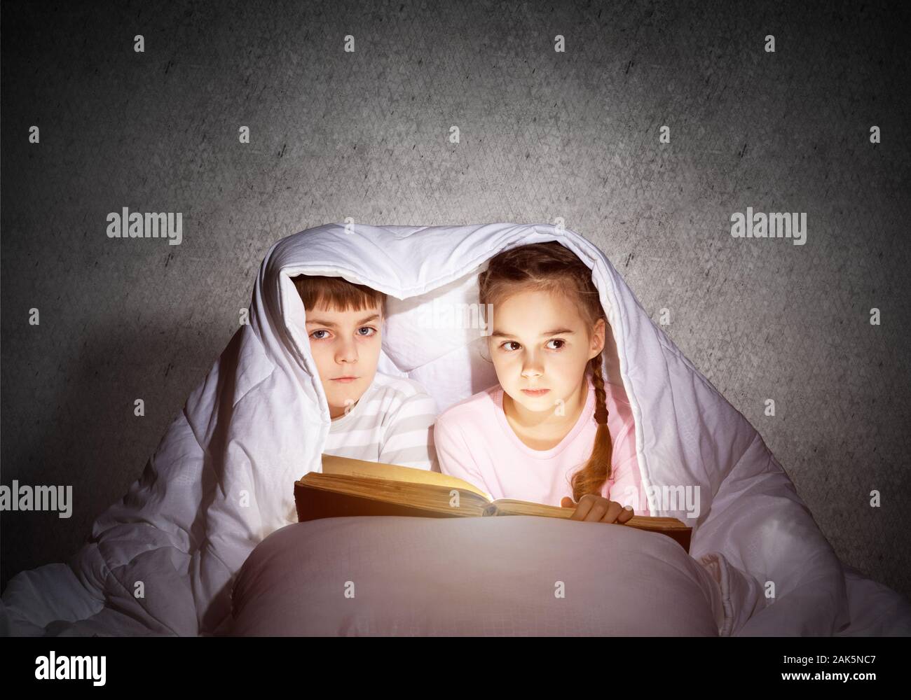 Little girl and boy looking at each other Stock Photo - Alamy