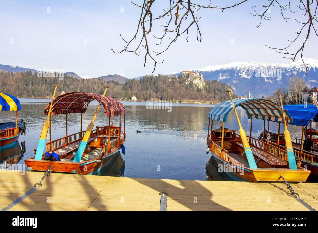 Traditional wooden boats on Lake Bled in Slovenia Stock Photo