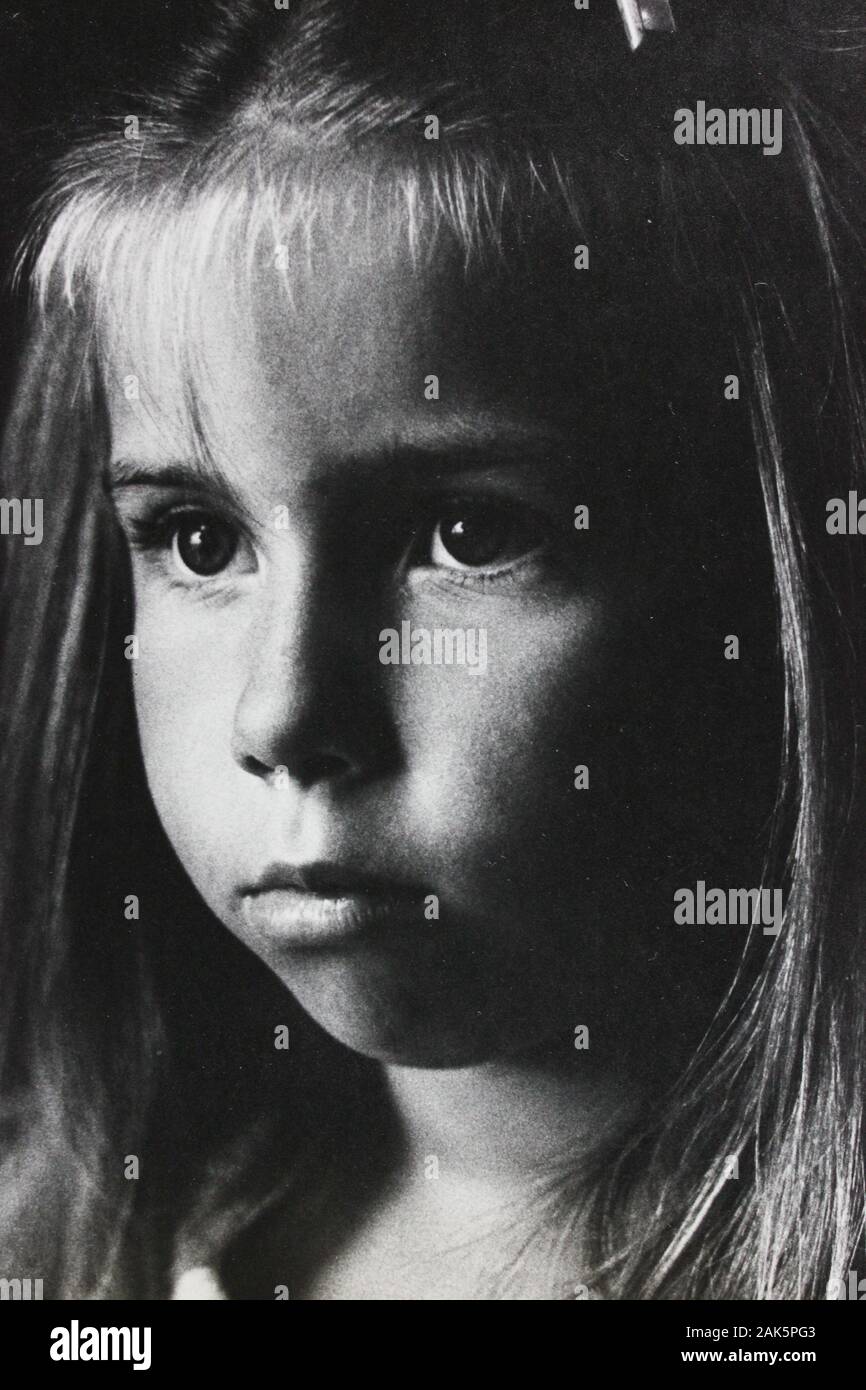 Fine 1970s black and white vintage photography of a young girl with an