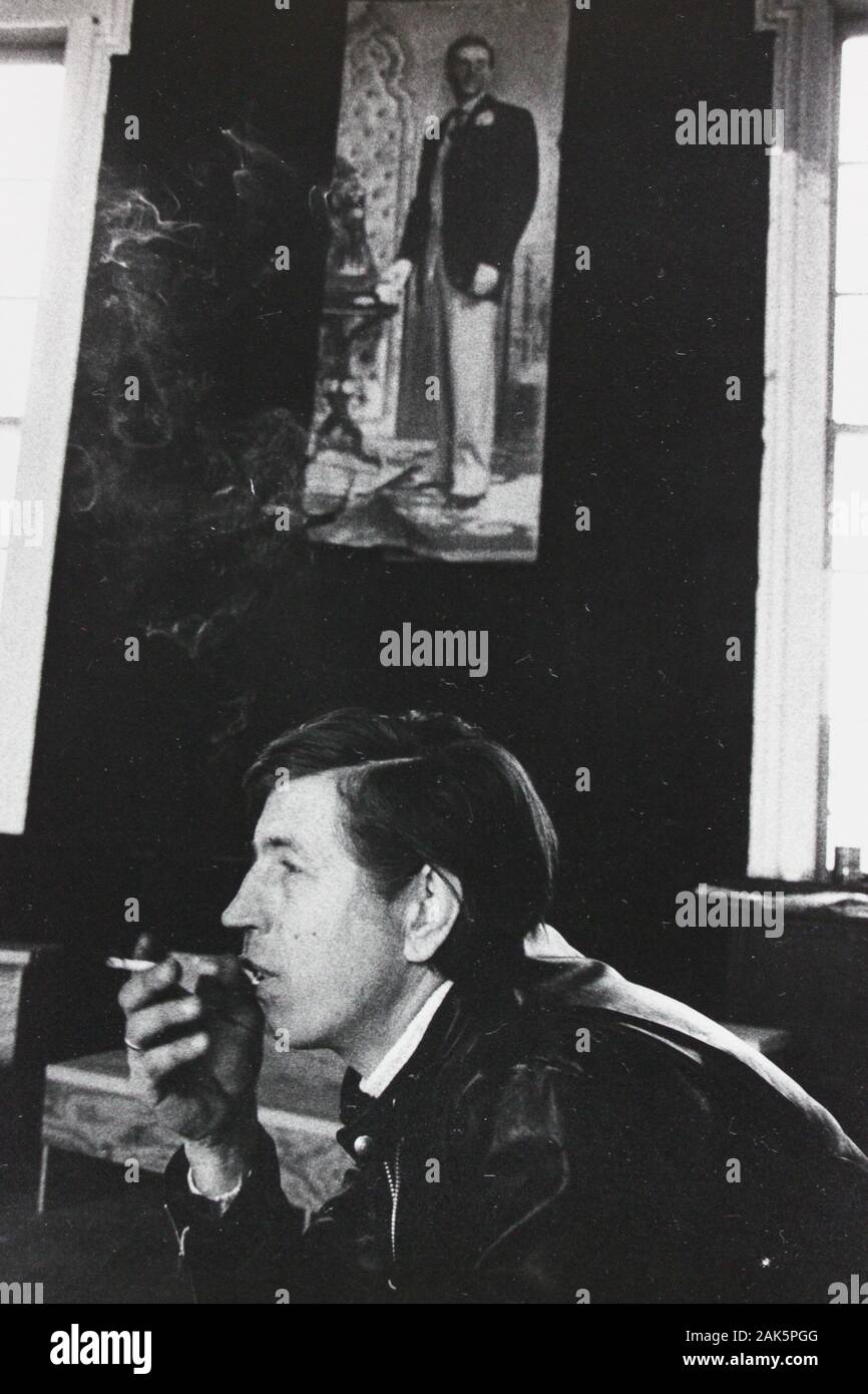Fine 1970s black and white vintage photography of a young man smoking a ...
