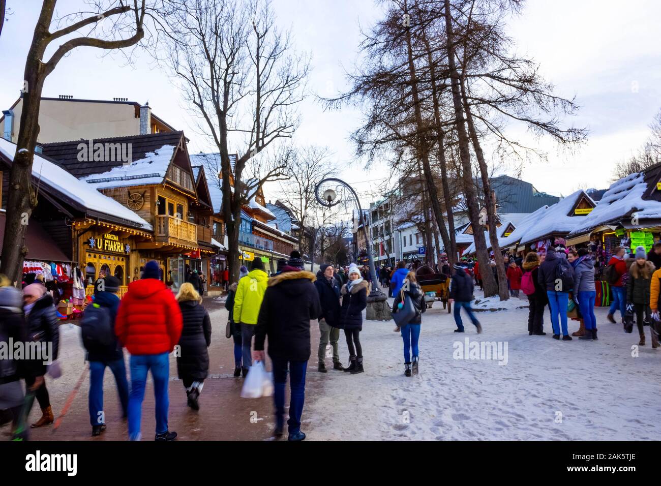 Zakopane, Poland - January 2, 2019: People walking at Krupowki street in Zakopane Stock Photo