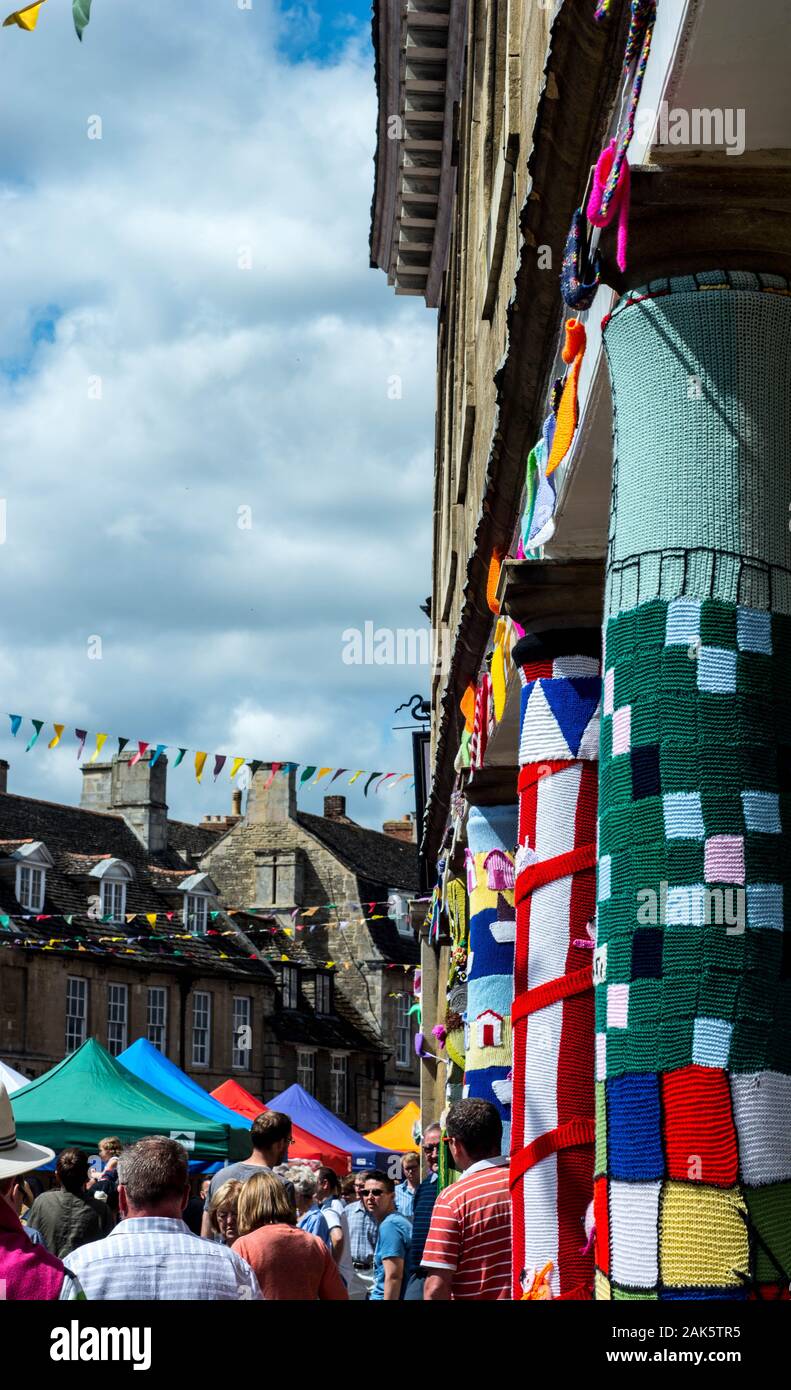 Yarn bombed buildings in Oundle, Northamptonshire on the day of a Summer Fayre Stock Photo