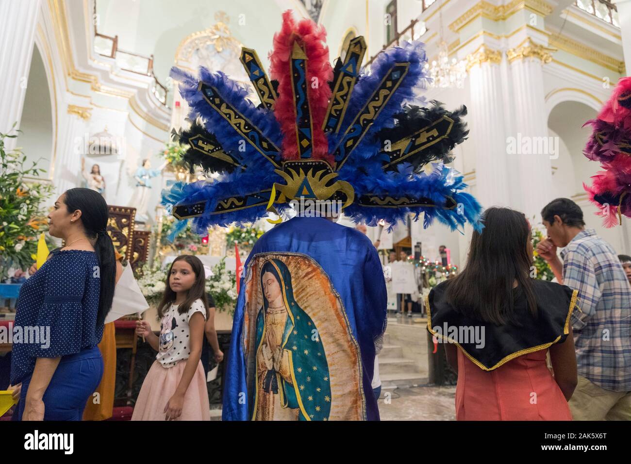 Festival of Our Lady of Guadalupe, indigenous participant in colourful attire Stock Photo