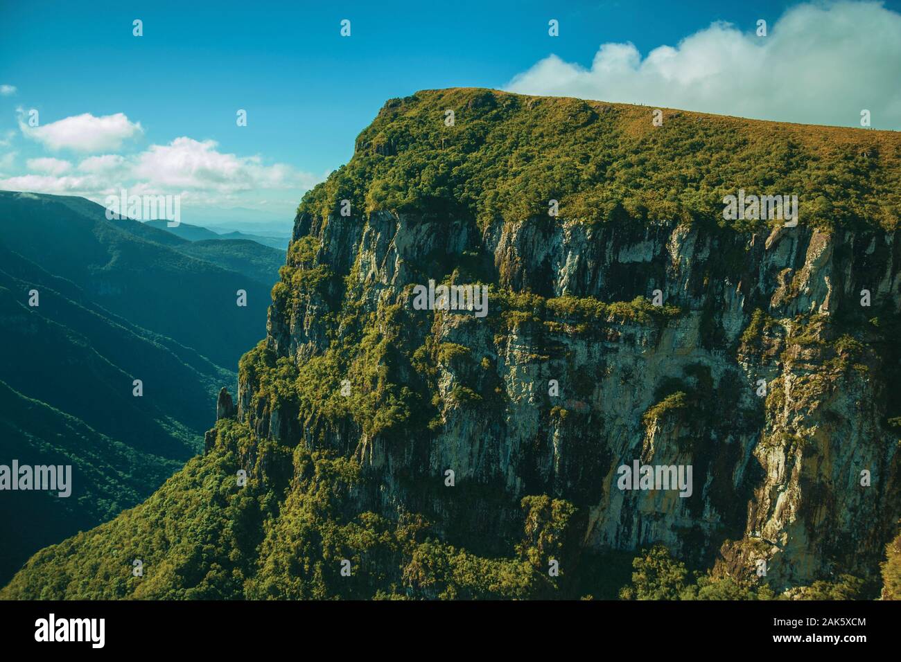 Fortaleza Canyon with steep rocky cliffs covered by thick forest near Cambara do Sul. A town with natural tourist sights in southern Brazil. Stock Photo
