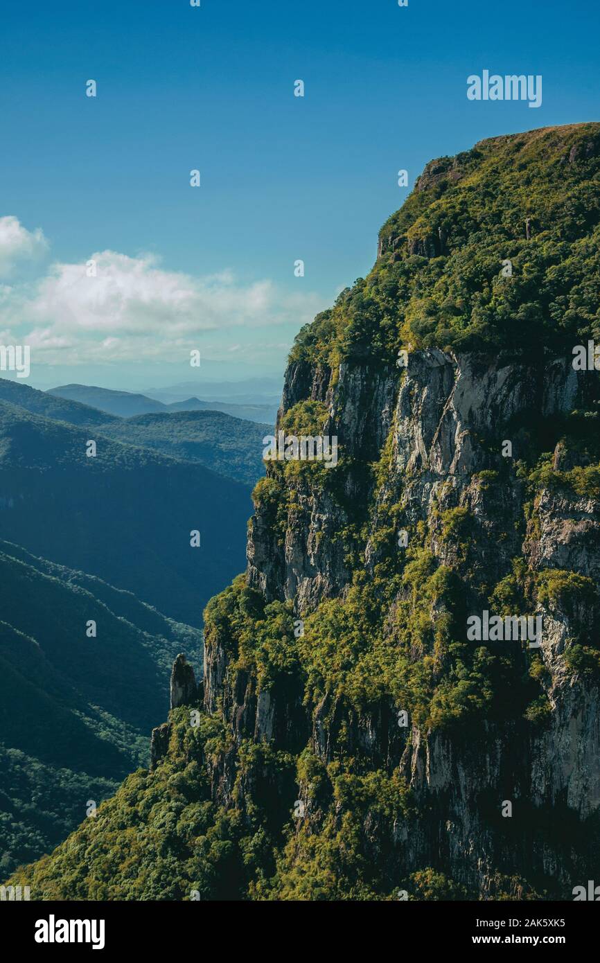 Fortaleza Canyon with steep rocky cliffs covered by thick forest near Cambara do Sul. A town with natural tourist sights in southern Brazil. Stock Photo