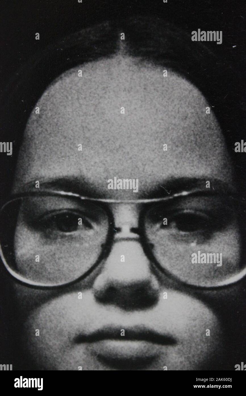Fine 1970s black and white vintage photography of an intent young woman ...