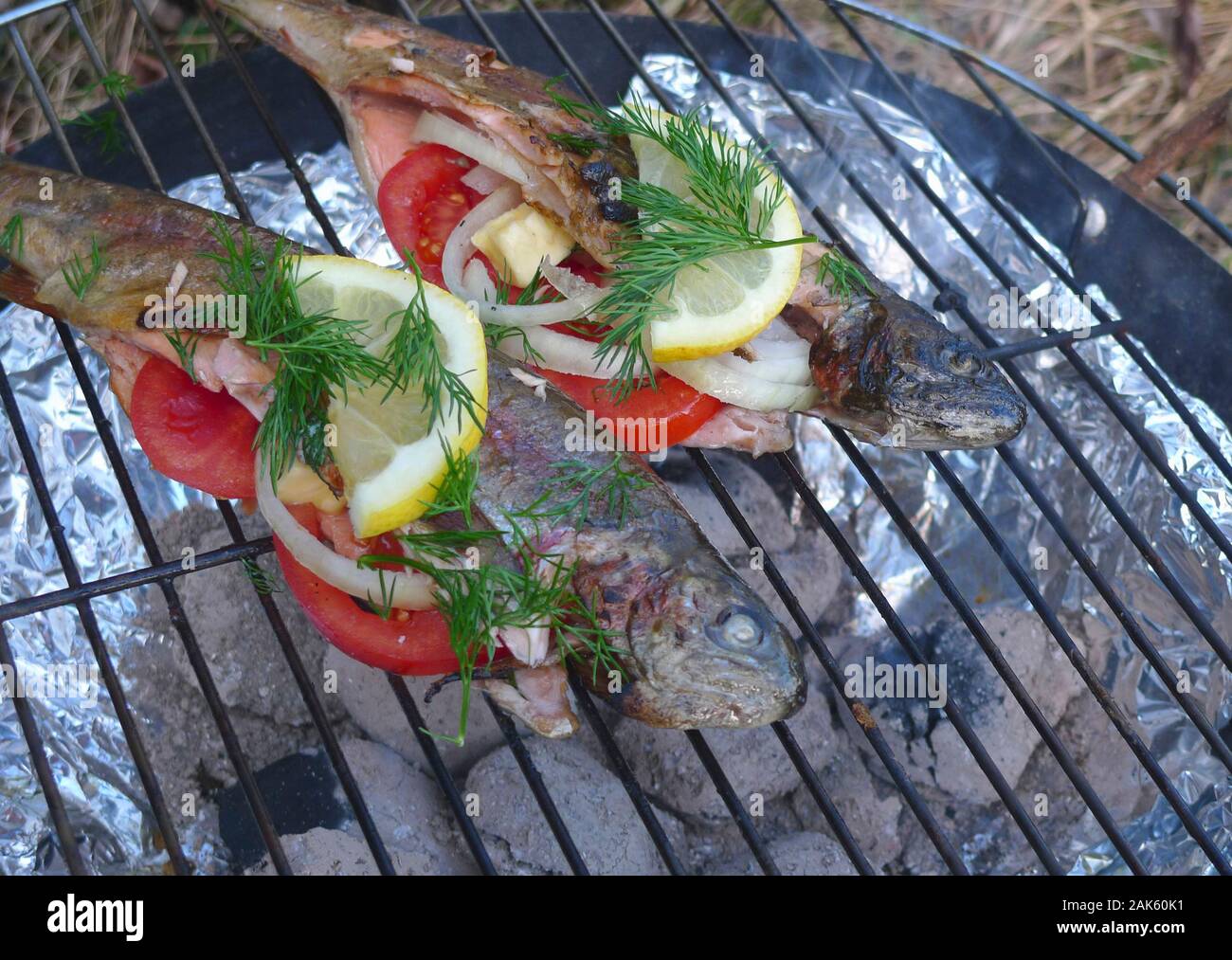 Grilled rainbow trout on the grill Stock Photo Alamy