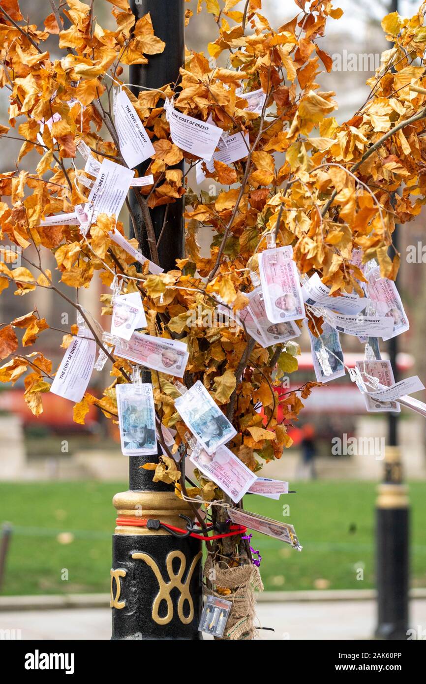 London UK 7th Jan. 2020 Pro and anti brexit protesters outside the Houses of Parliament A 'magic money tree' put up by anti brexit supporters Credit Ian DavidsonAlamy Live News Stock Photo
