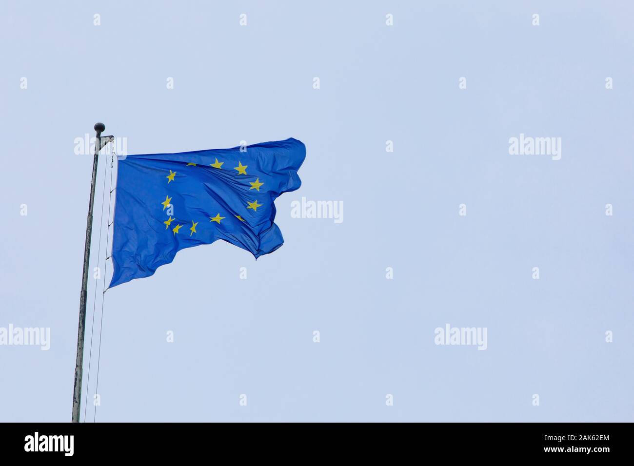european union flag in front of blue sky Stock Photo - Alamy