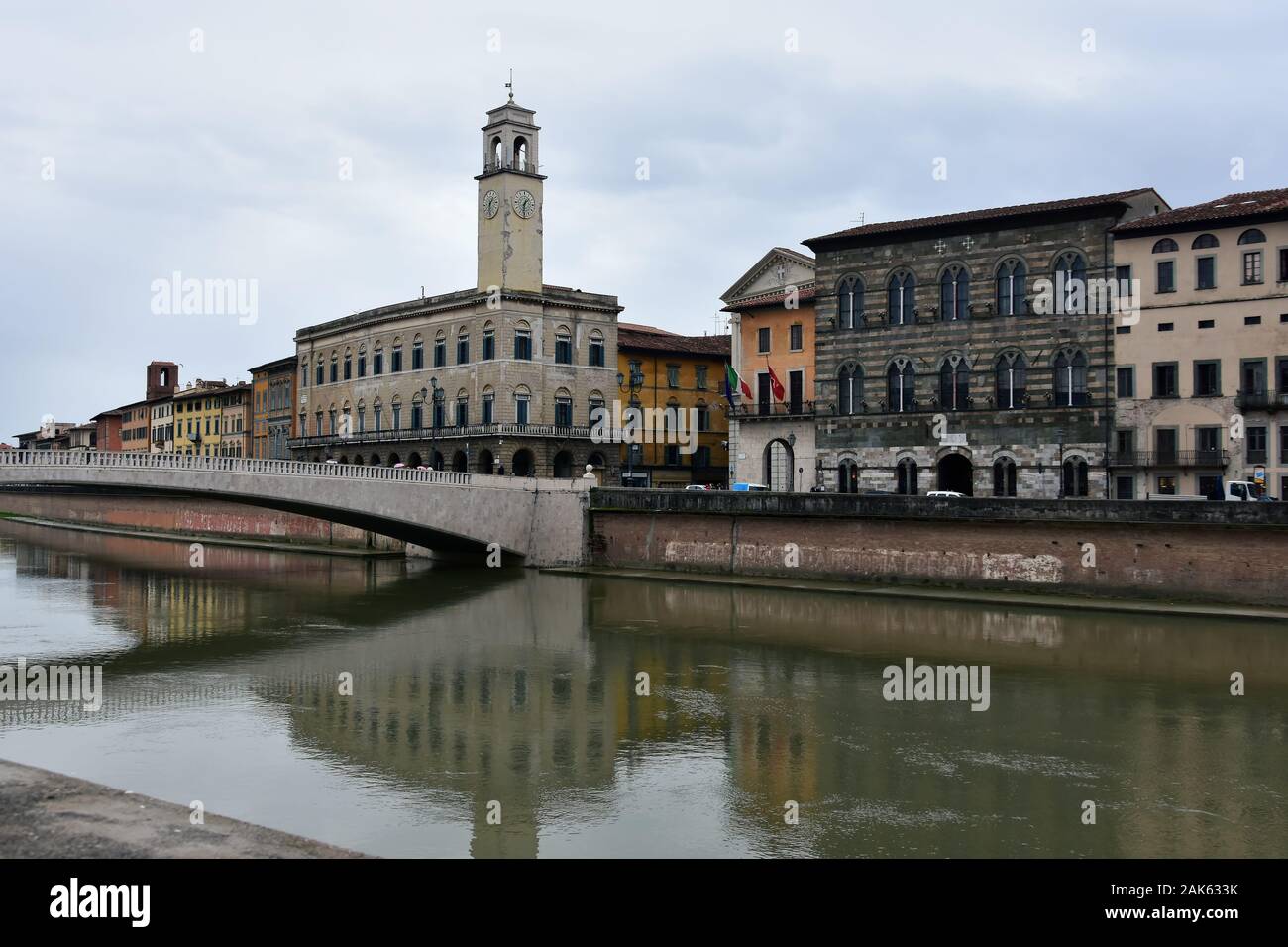 Dark cloudy spring day by Arno River, Pisa, Italy Stock Photo