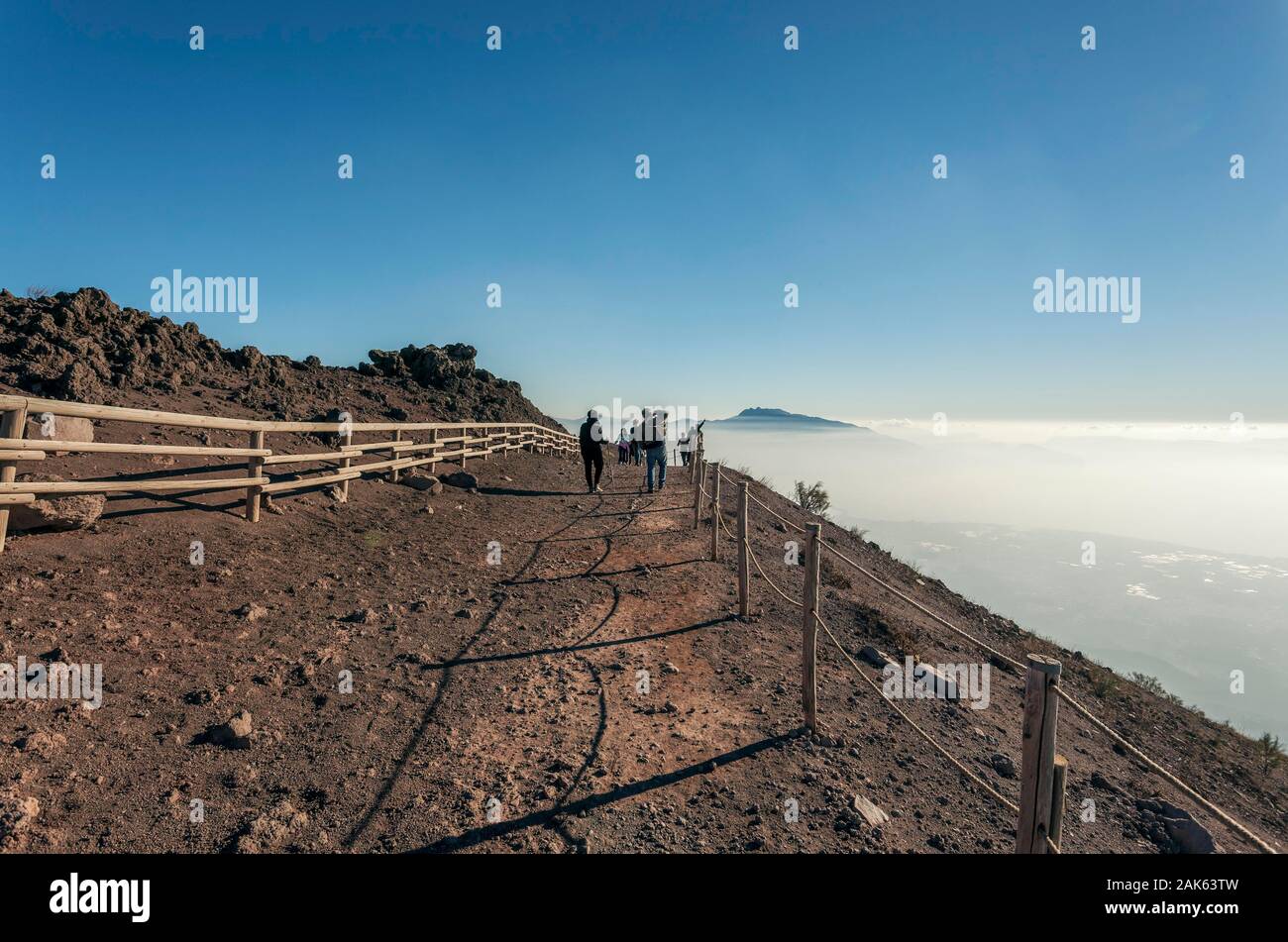 Tourists on top of Volcano Vesuvius, Vesuvius National Park, Naples, Campania, Italy Stock Photo