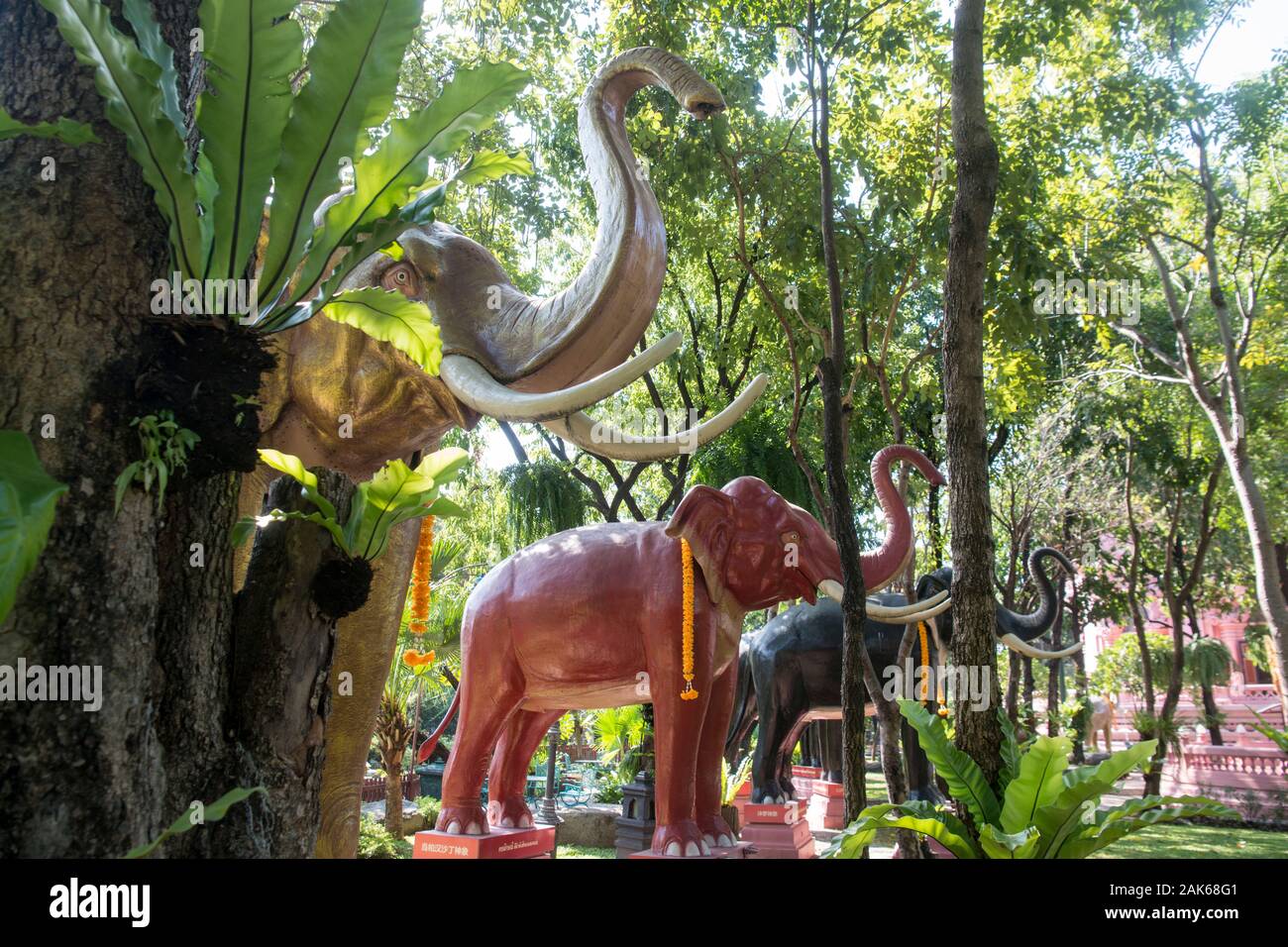 elephant statues in the garden of the Erewan Elephant Museum and temple