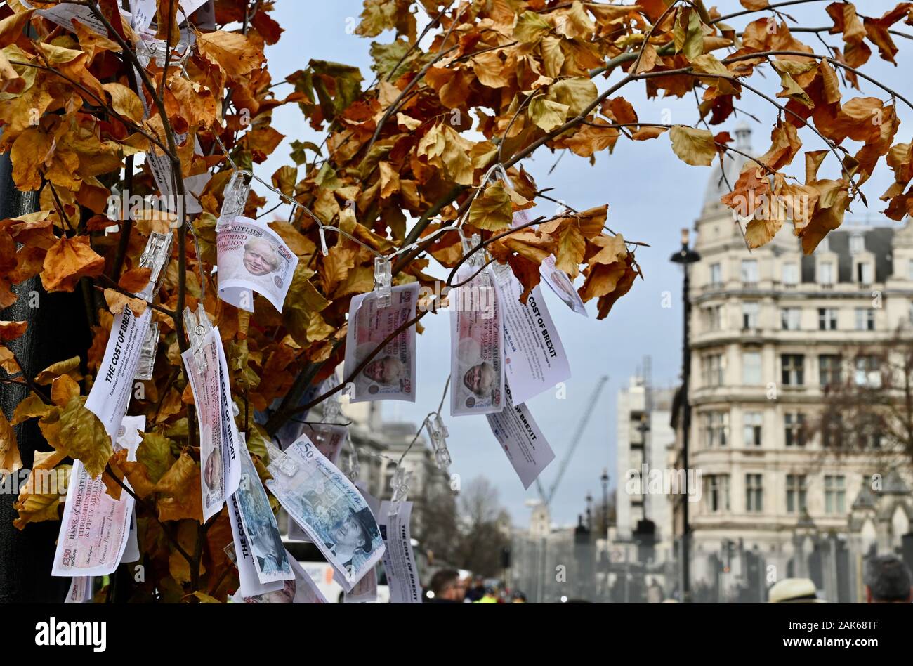 A fake Boris Johnson Brexit  Magic Money Tree was placed outside of Parliament by EU Supporters to show the true cost of Brexit. Houses of Parliament, Westminster, London. UK Stock Photo