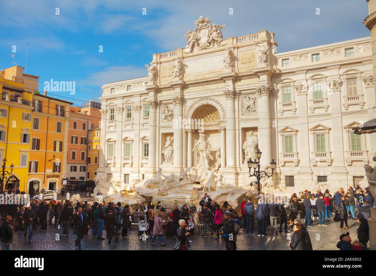 ROME - DECEMBER 12: The world famous Trevi Fountain crowded with tourists on December 12, 2019 in Rome, Italy. Stock Photo