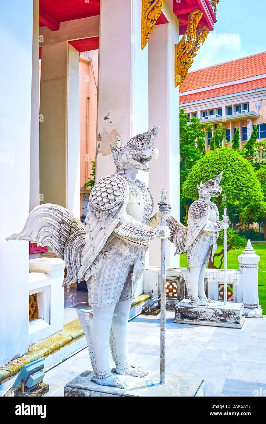 BANGKOK, THAILAND - APRIL 15, 2019: The group of guardians, the Garudas, standing at the main entrance to  Phuttaisawan Royal Hall in National Museum Stock Photo