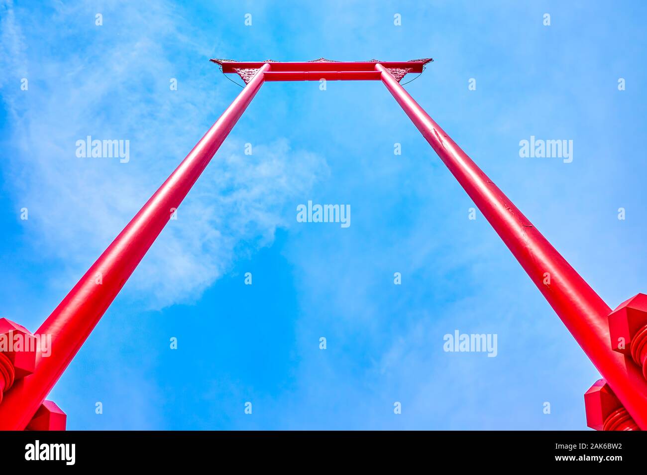 The amazing red timber Giant Swing is one of the most famous landmarks of Bangkok, Thailand Stock Photo