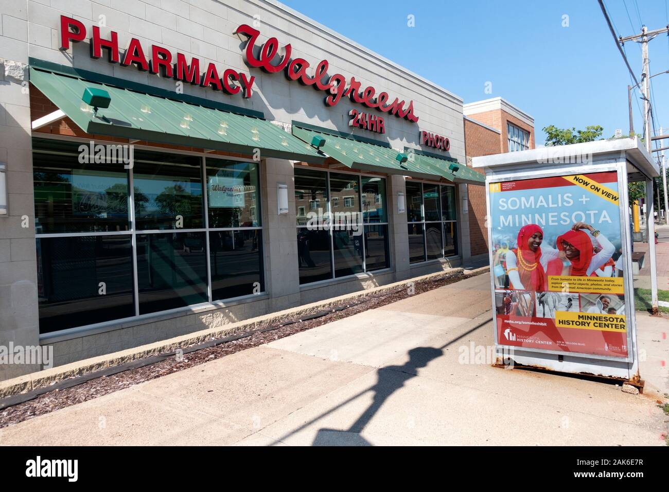 Sign at bus stop at Walgreens store advertising Somalis Exhibit at the Minnesota History Center. St Paul Minnesota MN USA Stock Photo