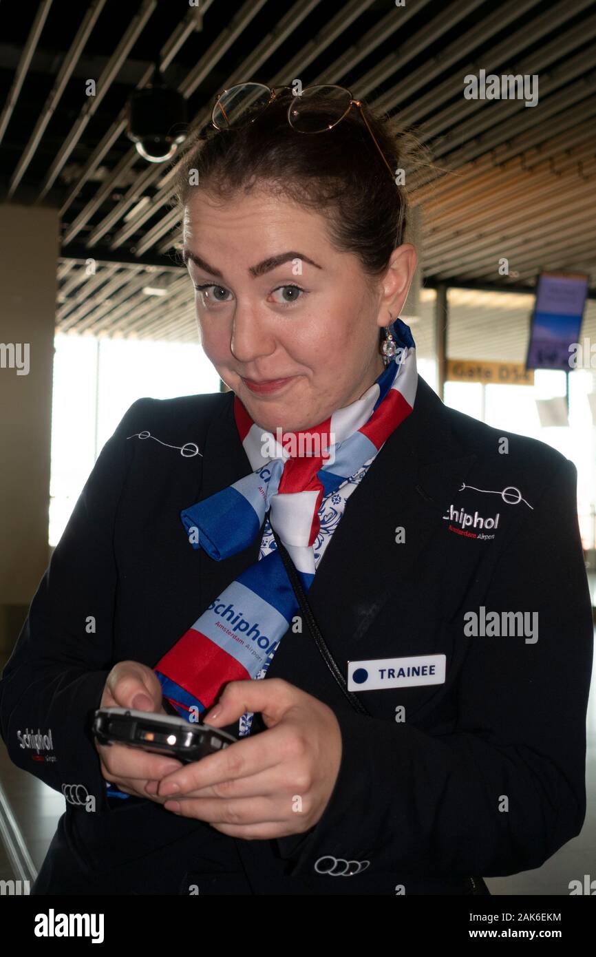 Smiling shuttle driver airport amsterdam schiphol checking schedule