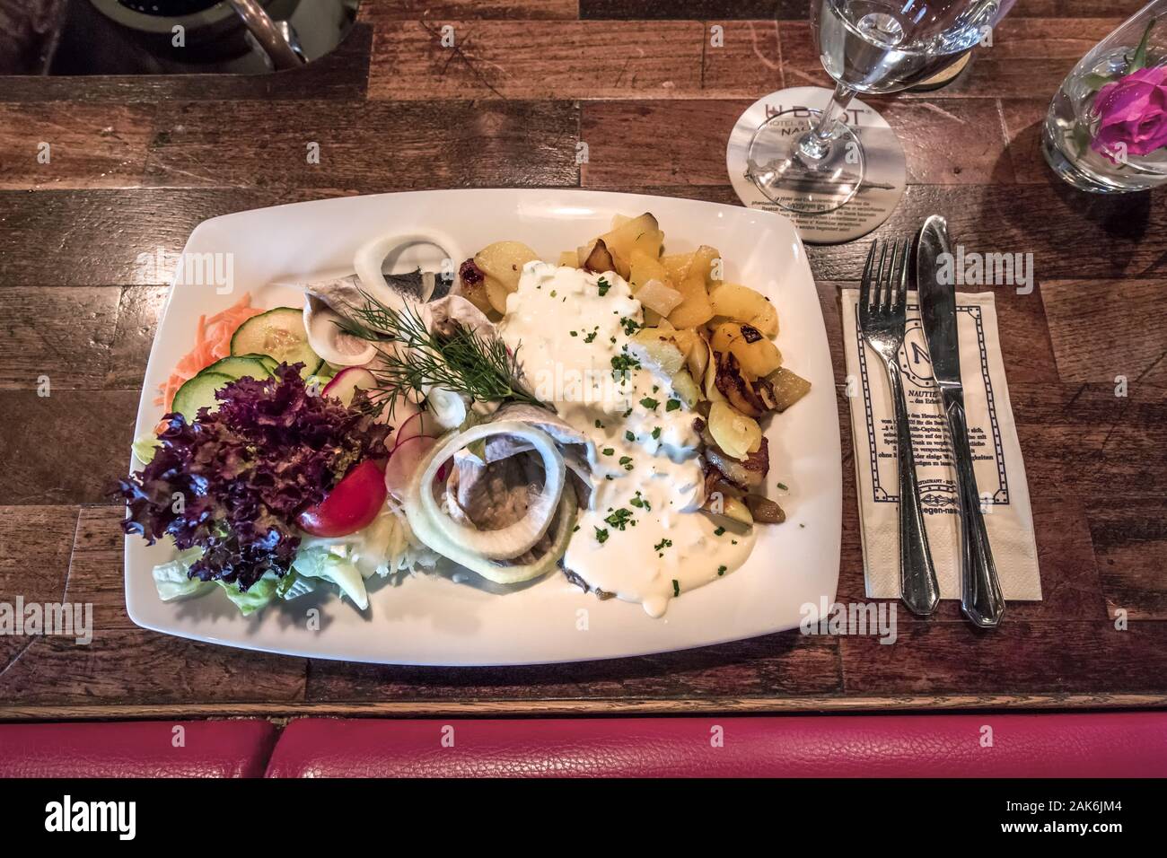 Putbus: Matjes mit Bratkartoffeln im Restaurant 'Nautilus' in der Dorfstraße, Ruegen | usage worldwide Stock Photo