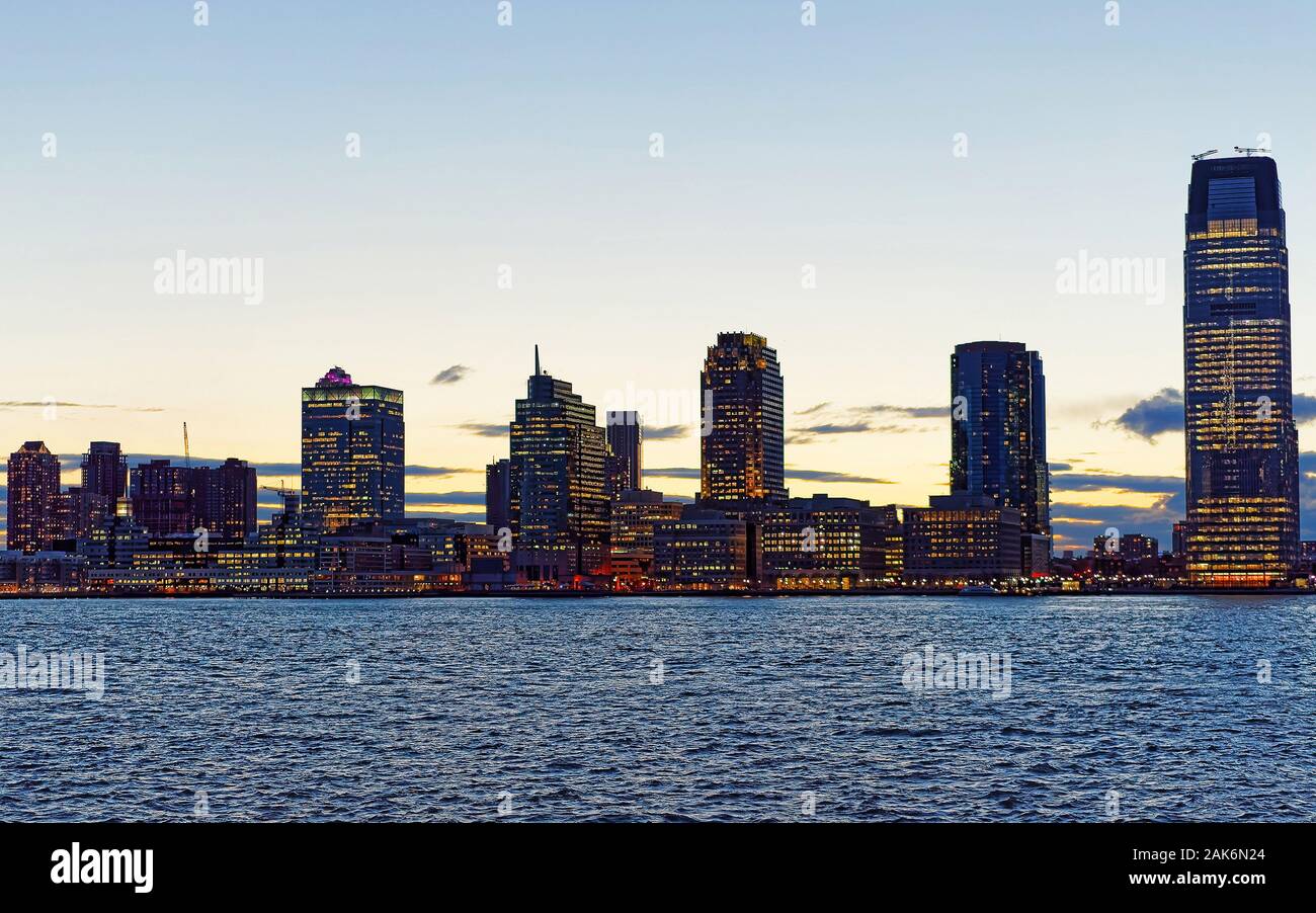 Jersey City skyline with skyscrapers at night reflex Stock Photo Alamy
