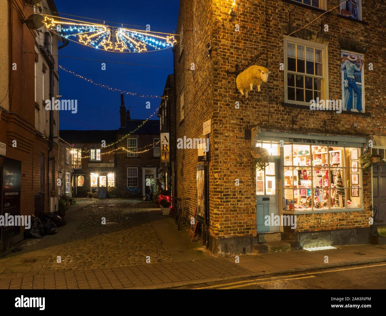 Christmas lights at Green Dragon Yard on Castlegate at dusk Knaresborough North Yorkshire