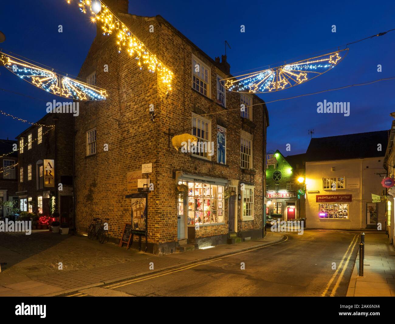 Christmas lights at Green Dragon Yard on Castlegate at dusk Knaresborough North Yorkshire