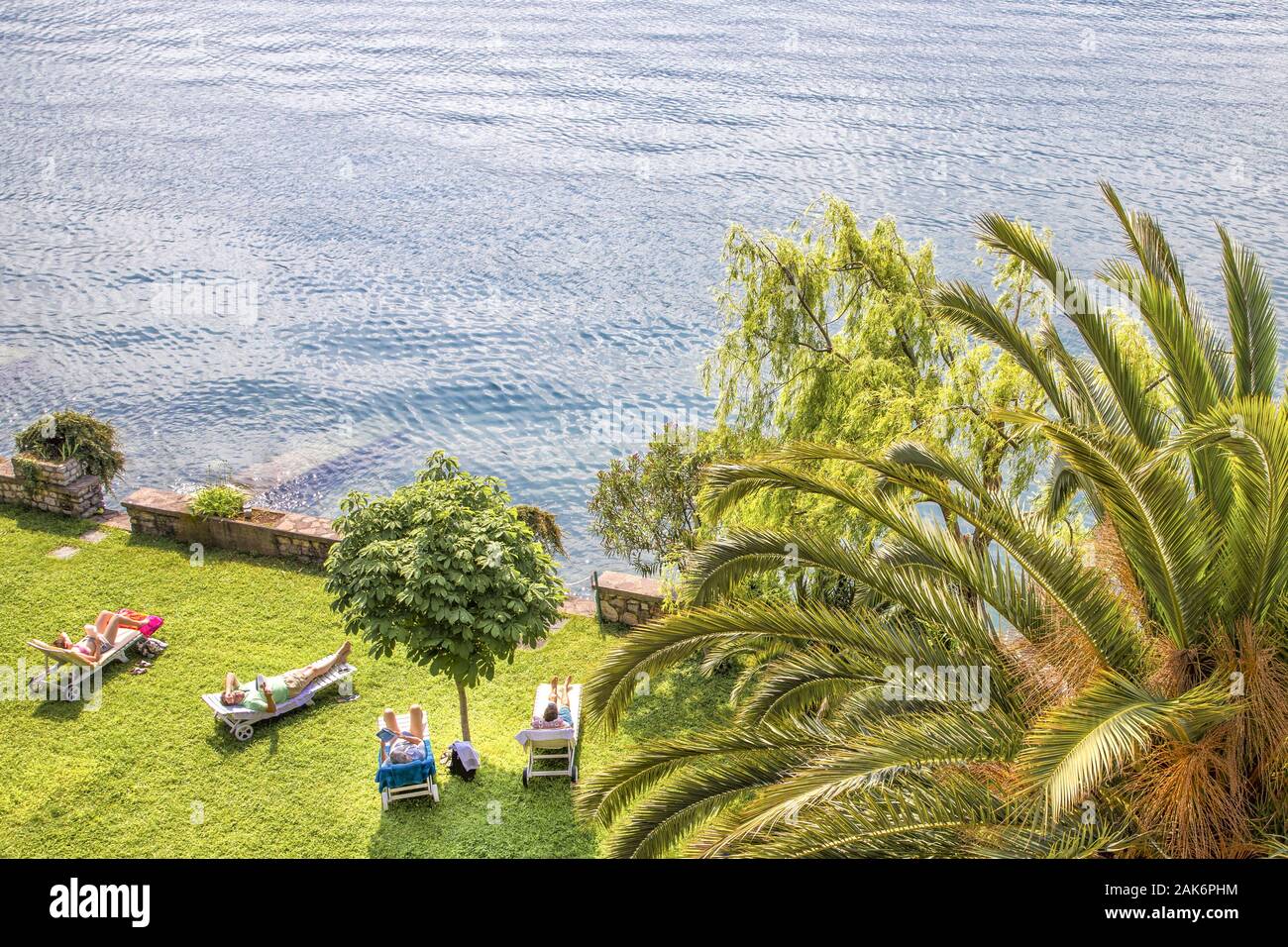 Tignale: 'Hotel Forbisicle', Palmengarten und hoteleigener Zugang zum See, Gardasee | usage worldwide Stock Photo