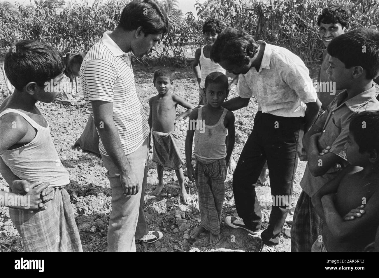 12/30/34 Uri Char boy ploughing rice field Stock Photo