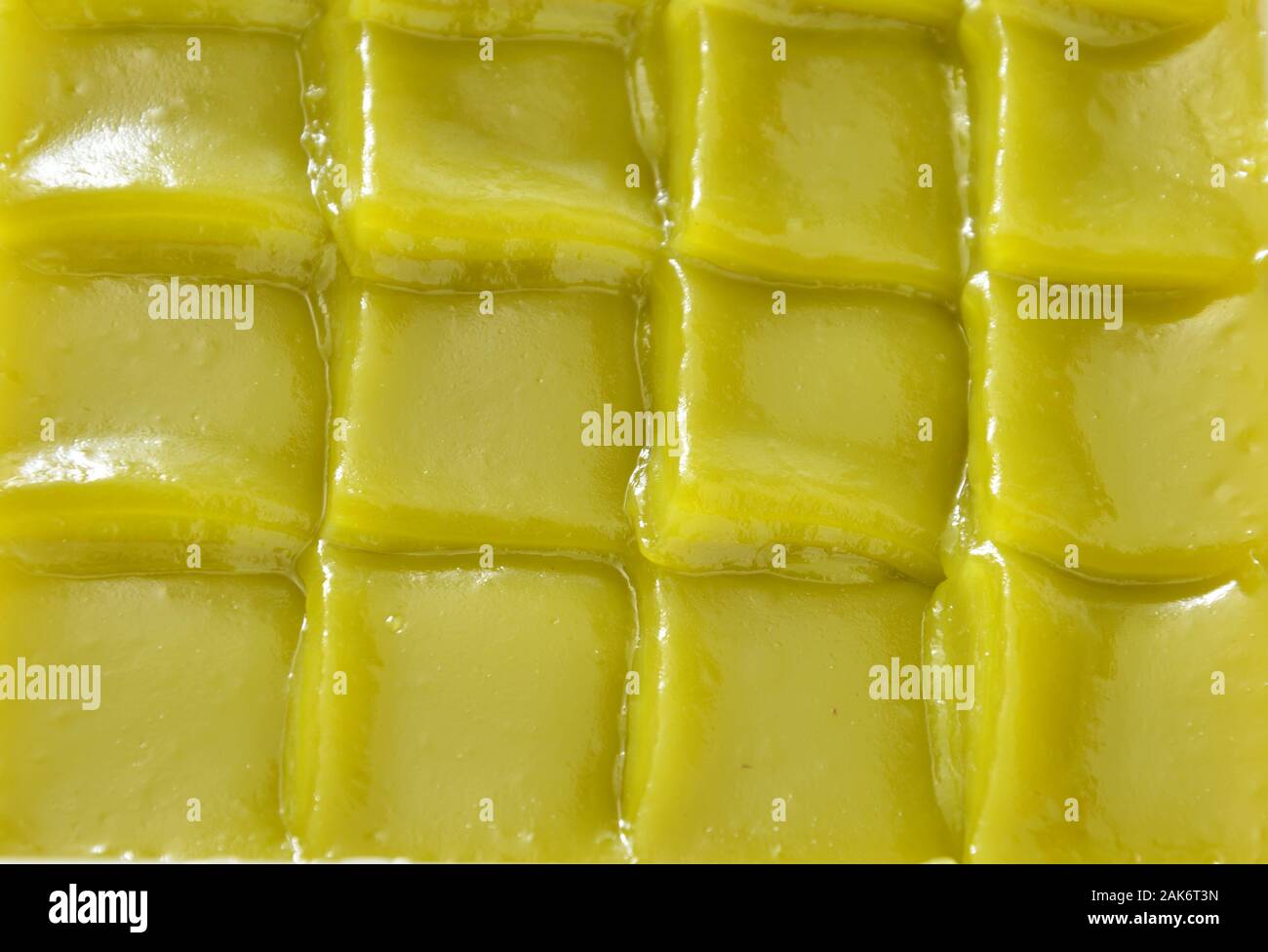 green layer sweet sticky cake Thai dessert on plastic tray Stock Photo