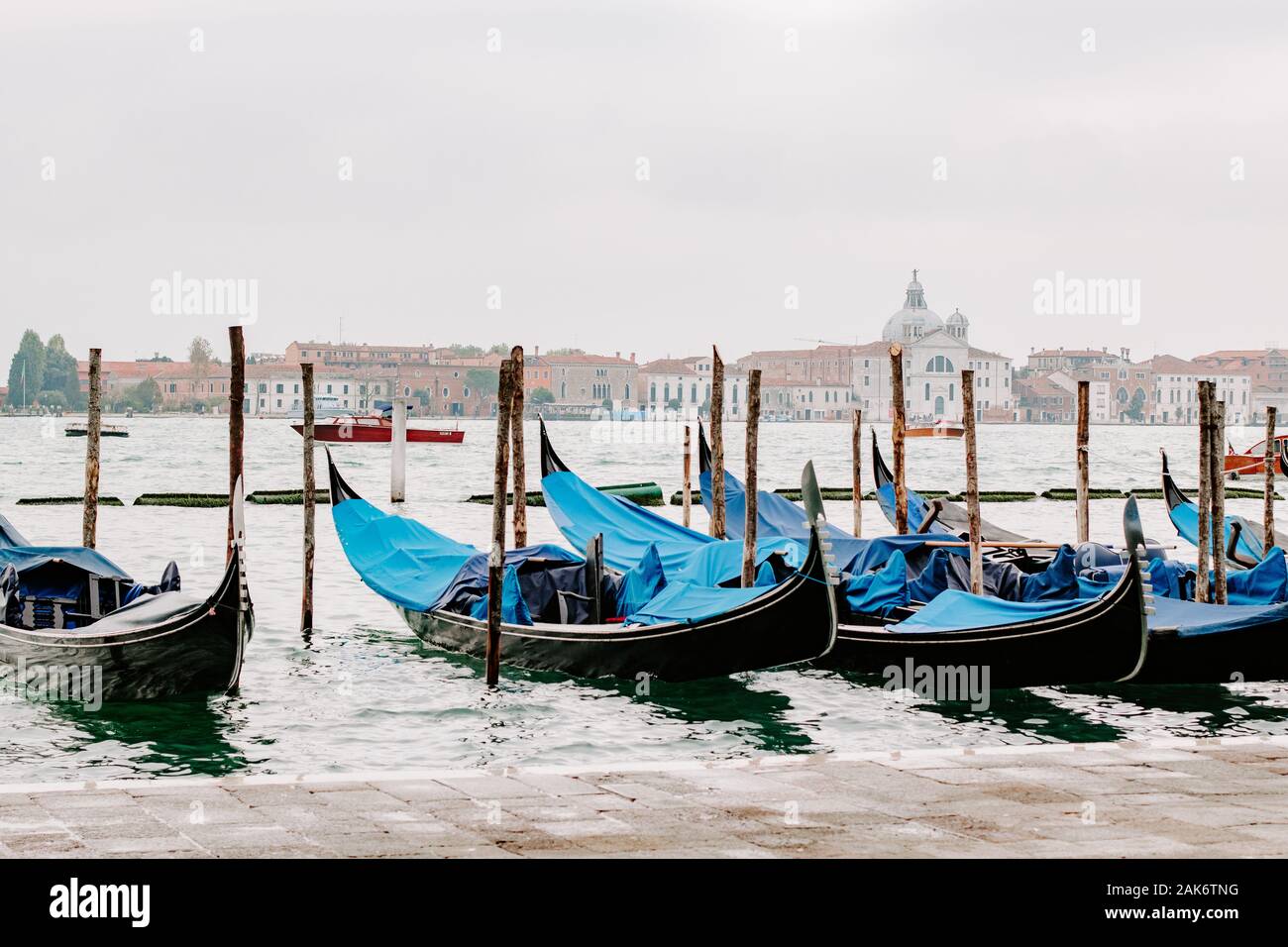 Gondolas, gondolos, docked at San Zaccaria, Piazza S.Marco, Venice Italy, tourist attraction, things to do venice, trip, venice tourist concept, Stock Photo
