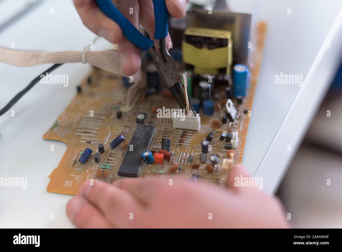 Group of young engineers working on robotics project. Scientist ...