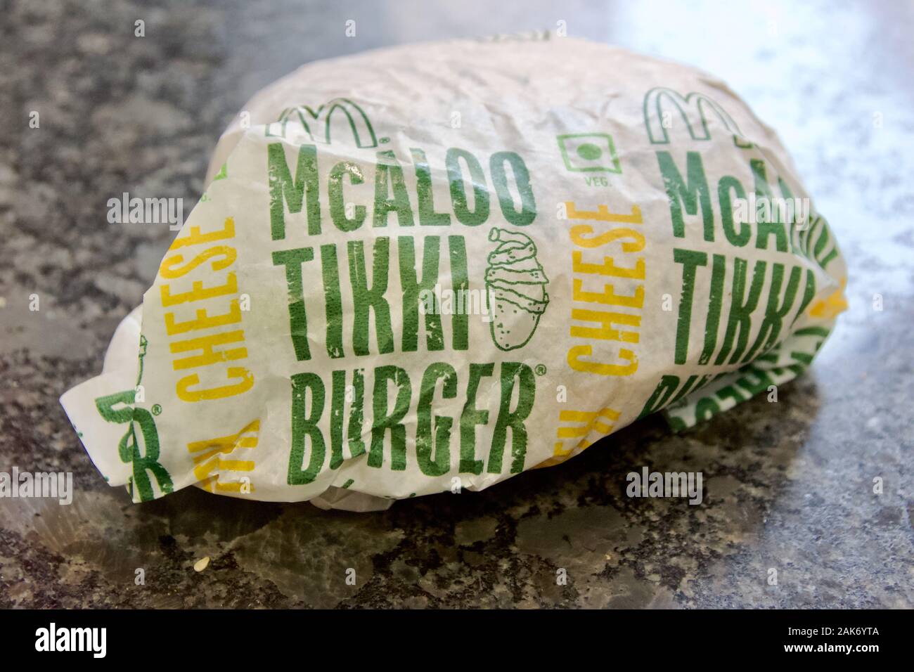 A vegetarian McAloo Tikki Burger from McDonalds in India Stock Photo