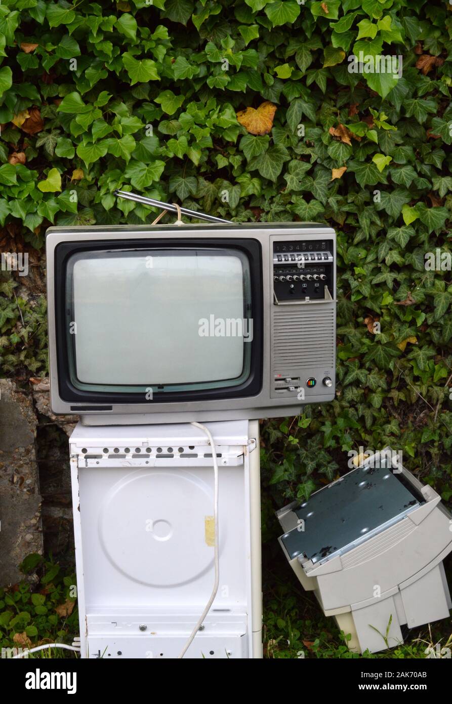 Electronic waste, including an obsolete television for the recycling of electronic waste Stock Photo