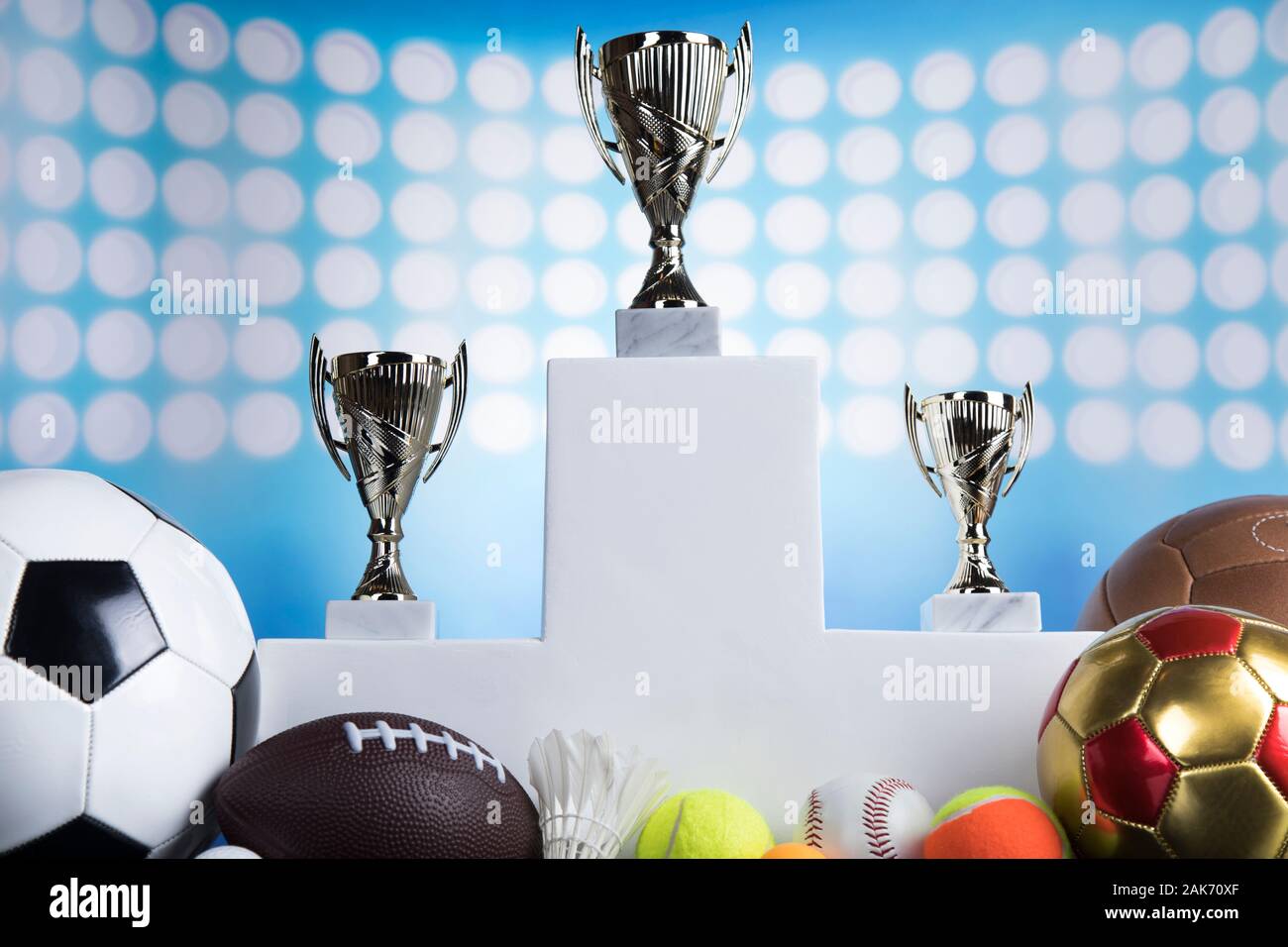 Podium for sports awards, equipment and balls Stock Photo